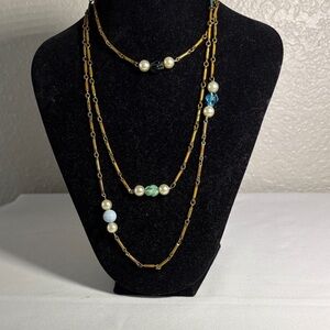 Elegant Gold and Pearl Multi-Layer Necklace